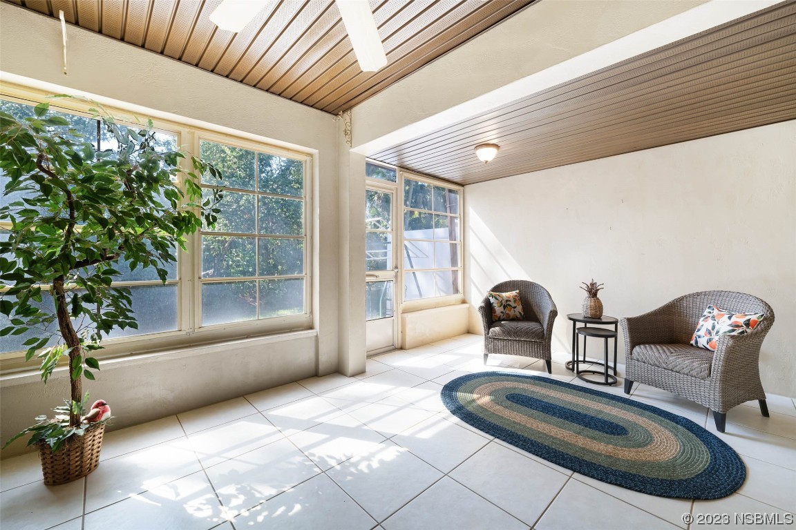 46 Big Buck Trail Ormond Beach, FL 32174 - Photo 28 of 41 a living room with furniture and a large window