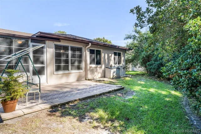 a view of a backyard with a garden