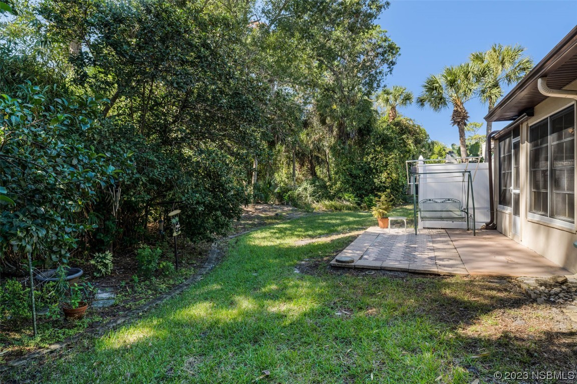 46 Big Buck Trail Ormond Beach, FL 32174 - Photo 31 of 41 a view of a backyard with a garden