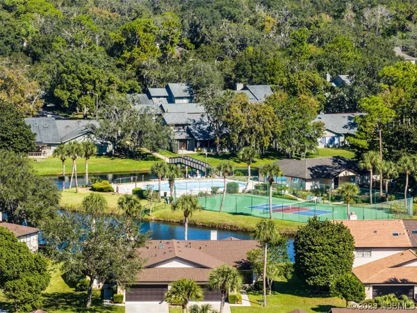 a view of a swimming pool with a lake view