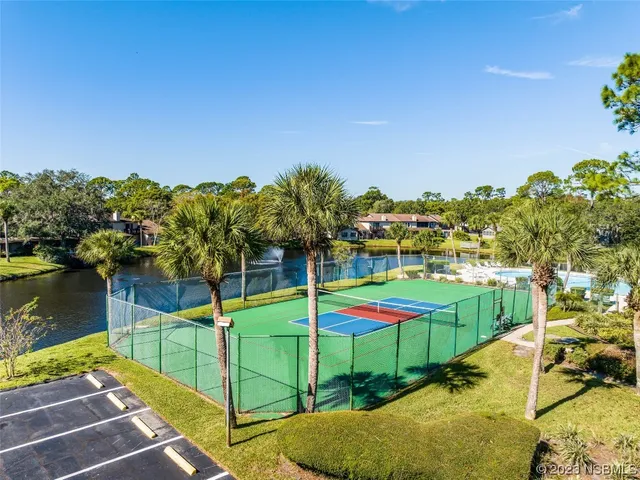 a view of a swimming pool with an ocean yard