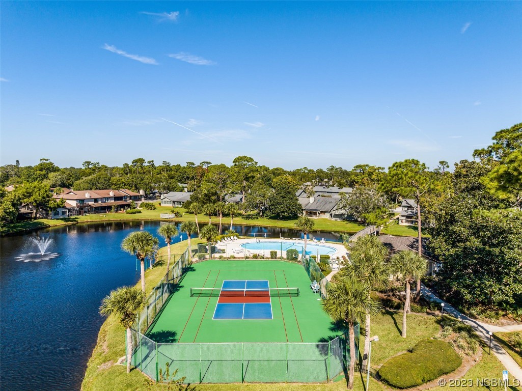 46 Big Buck Trail Ormond Beach, FL 32174 - Photo 37 of 41 a view of a swimming pool with a lake view