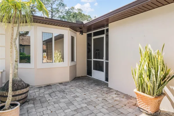 a view of a entryway door front of house