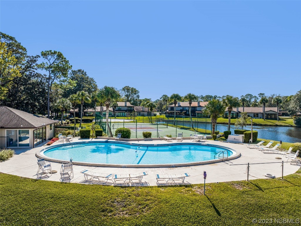 46 Big Buck Trail Ormond Beach, FL 32174 - Photo 41 of 41 a view of a swimming pool with lounge chairs