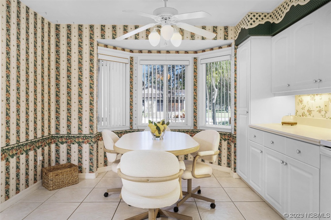 46 Big Buck Trail Ormond Beach, FL 32174 - Photo 9 of 41 a view of a dining room with furniture and chandelier
