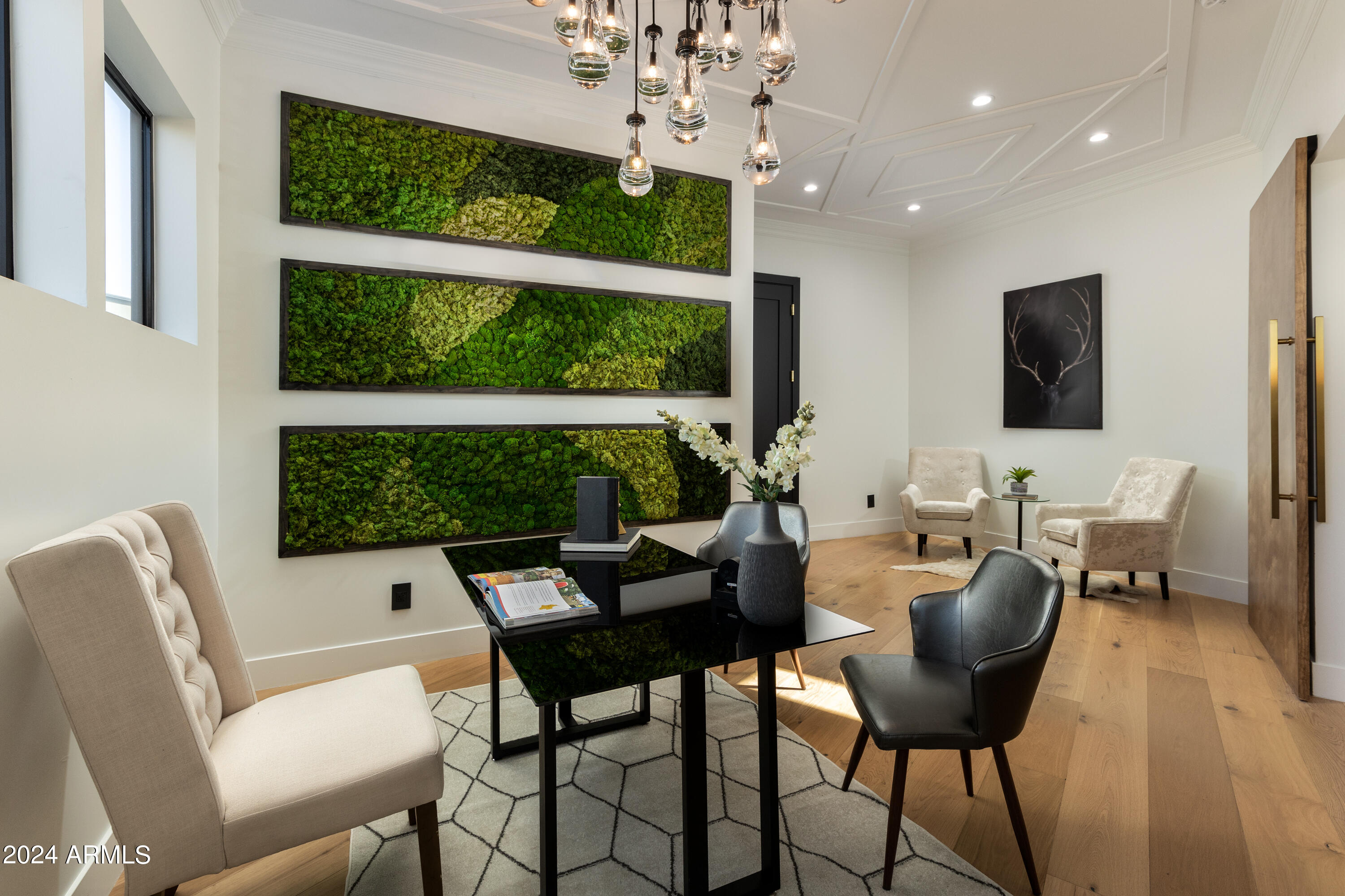 3045 North Marigold Drive Phoenix, AZ 85018 - Photo 17 of 65 a dining room with furniture a large window and a chandelier