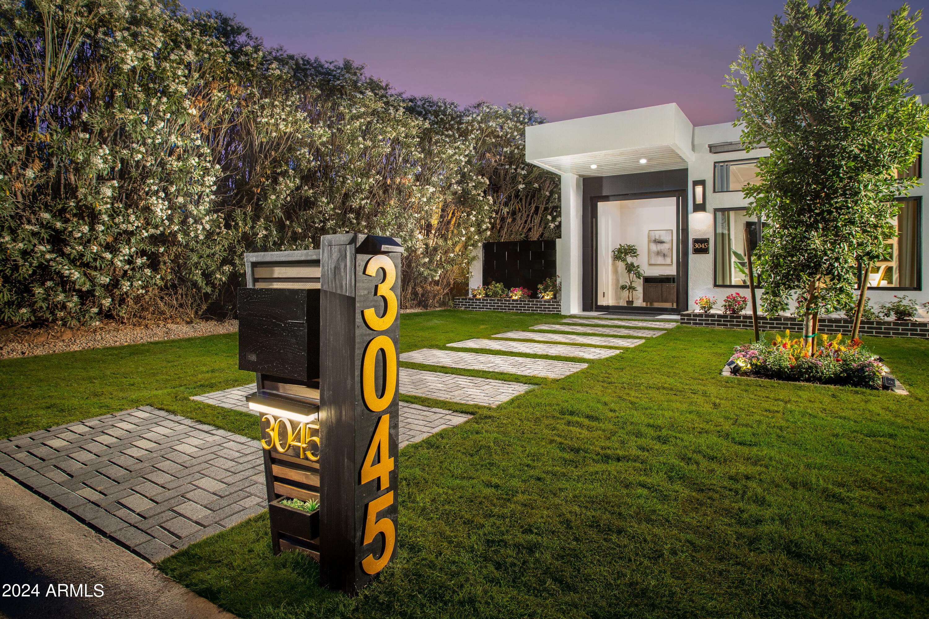 3045 North Marigold Drive Phoenix, AZ 85018 - Photo 4 of 65 a house view with a garden space