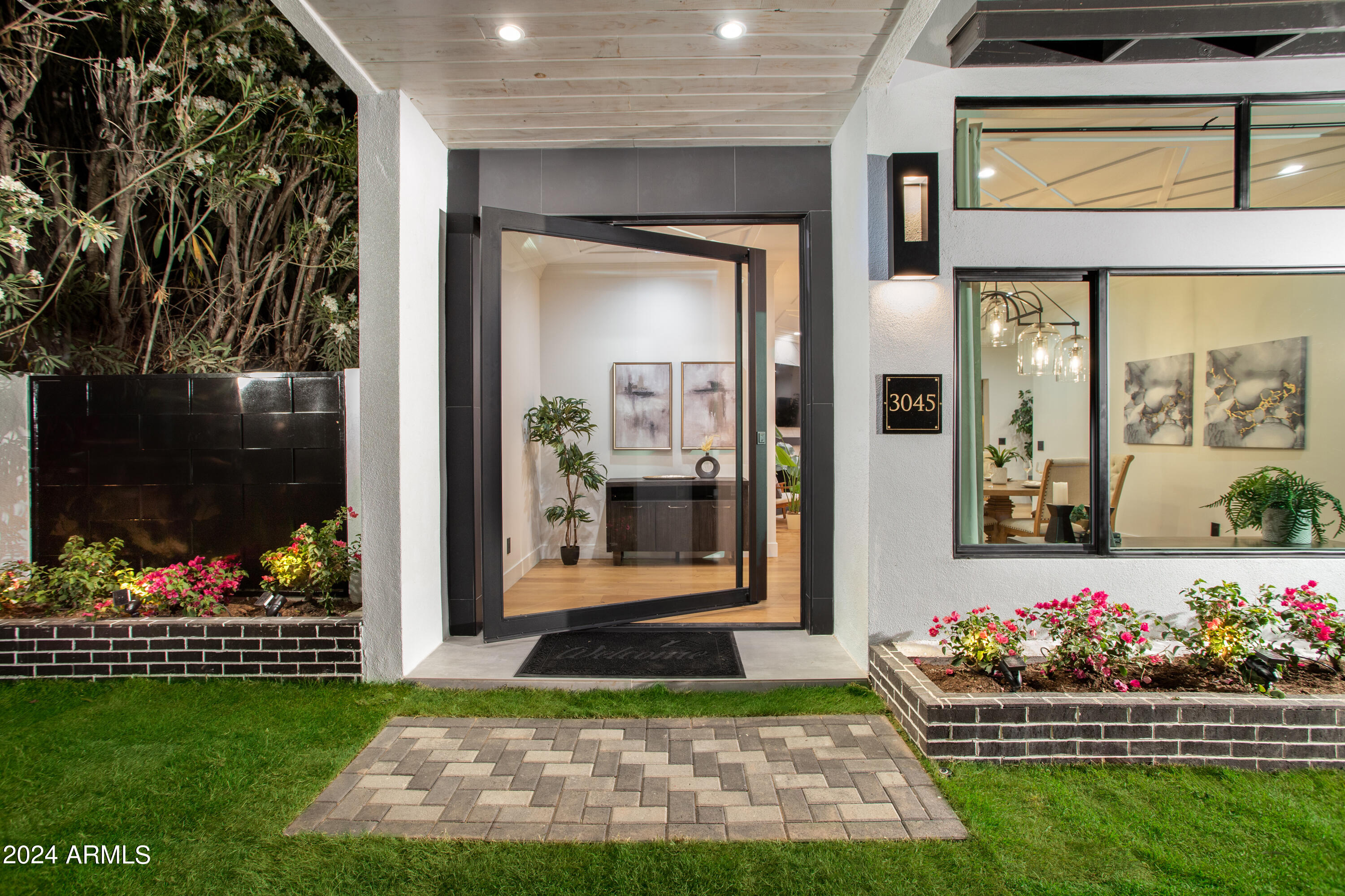 3045 North Marigold Drive Phoenix, AZ 85018 - Photo 5 of 65 a view of a room that has a lot of flowers in it