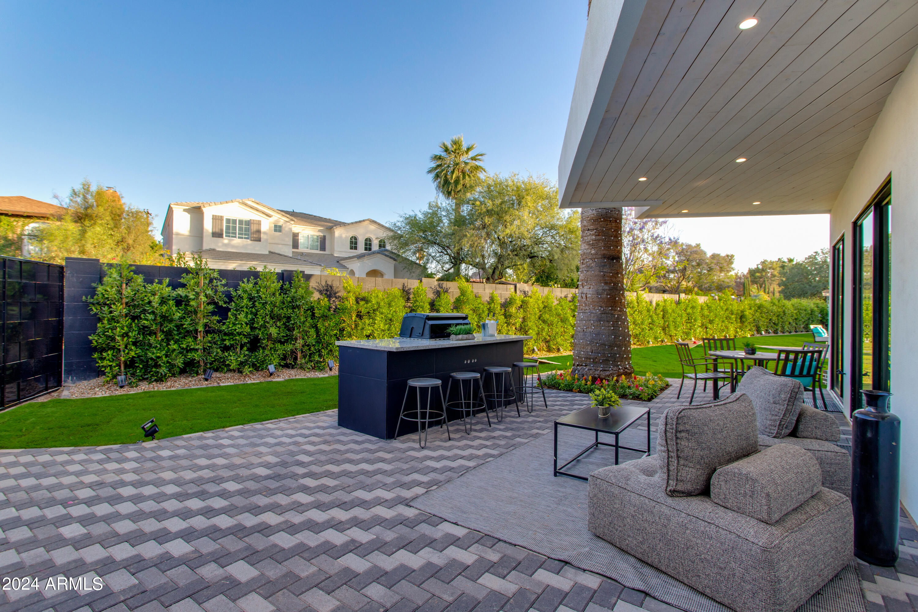 3045 North Marigold Drive Phoenix, AZ 85018 - Photo 56 of 65 a balcony with furniture and a garden