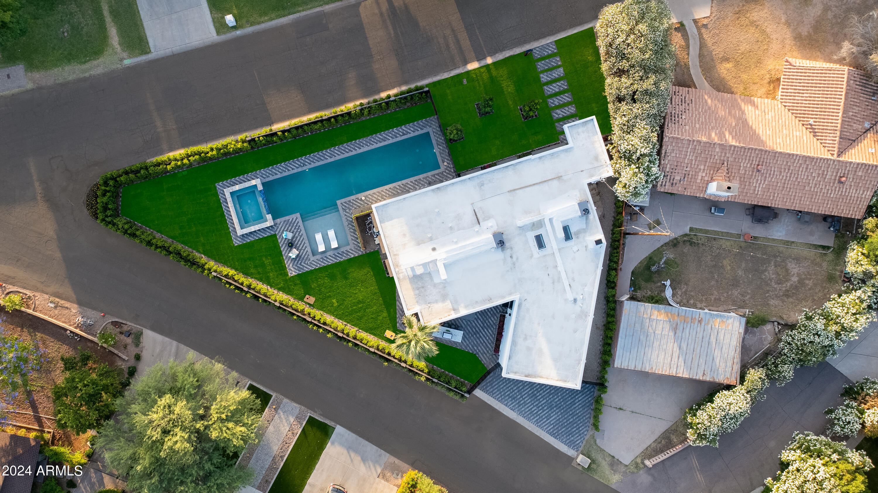 3045 North Marigold Drive Phoenix, AZ 85018 - Photo 62 of 65 an aerial view of a house with a yard and potted plants