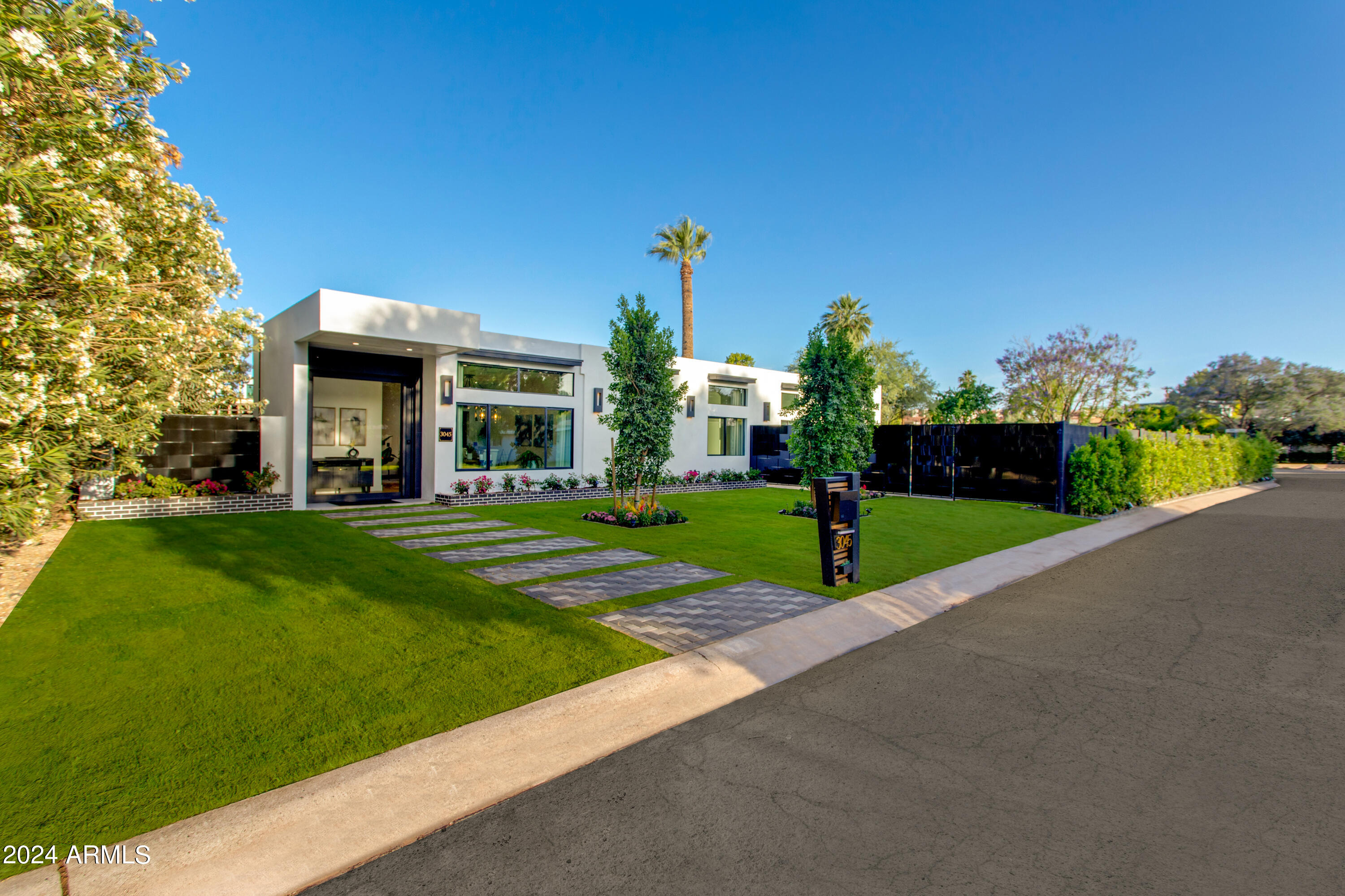 3045 North Marigold Drive Phoenix, AZ 85018 - Photo 7 of 65 a house view with a garden space