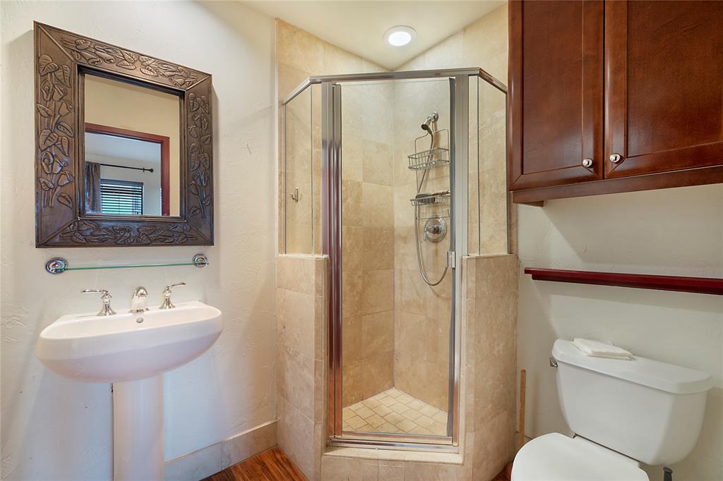 1016 Liberty Street, Unit 4 Dallas, TX 75204 - Photo 26 of 33 a bathroom with a sink toilet and shower