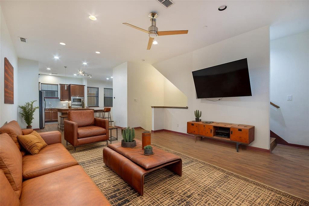 1016 Liberty Street, Unit 4 Dallas, TX 75204 - Photo 4 of 33 a living room with furniture and a flat screen tv