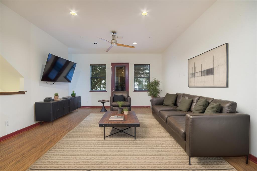 1016 Liberty Street, Unit 4 Dallas, TX 75204 - Photo 5 of 33 a living room with furniture and a flat screen tv