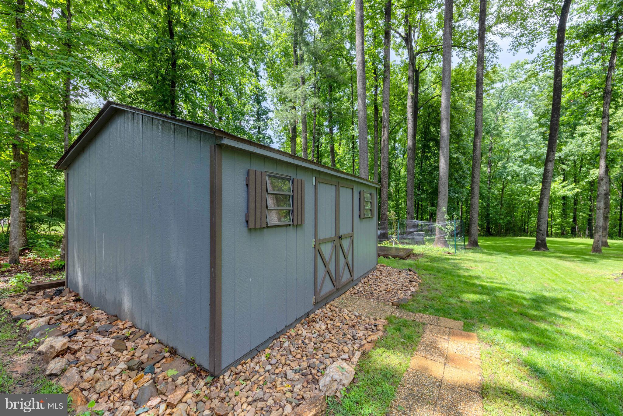 1425 Jacks Shop Road Rochelle, VA 22738 - Photo 54 of 56 a backyard of a house with lots of green space