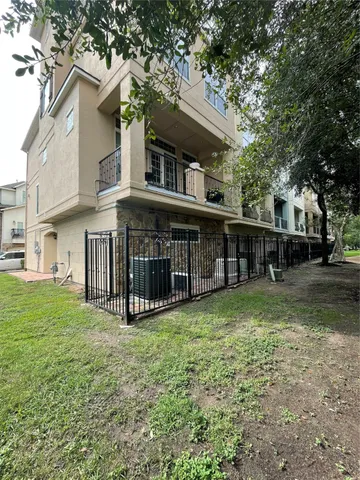 a front view of a house with yard