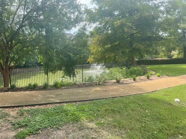 a view of a yard with green space