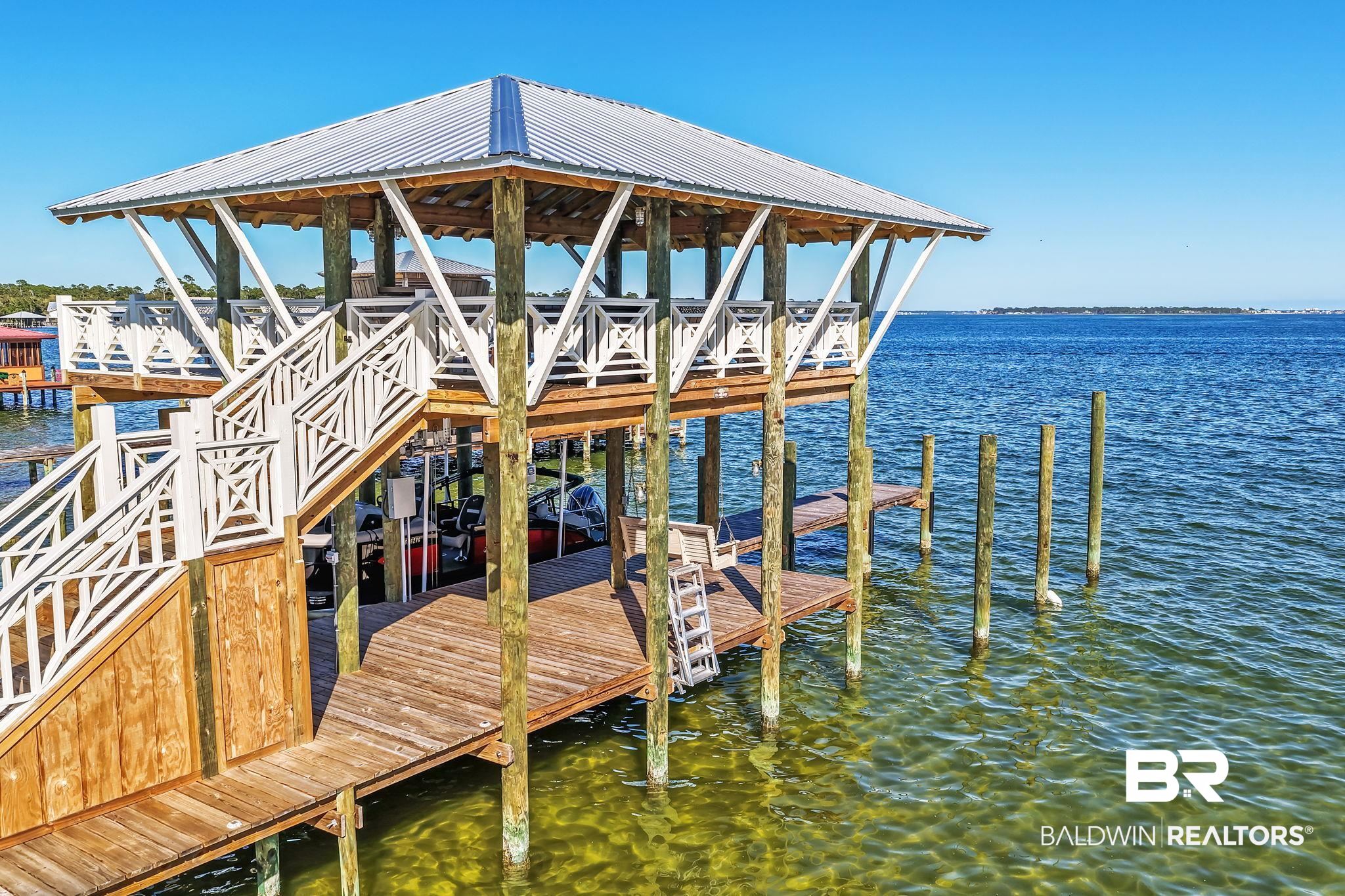 6434 County Road 95 Elberta, AL 36530 - Photo 65 of 99 Dock area with a water view and stairs
