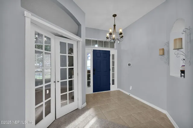 a view of a livingroom with a chandelier