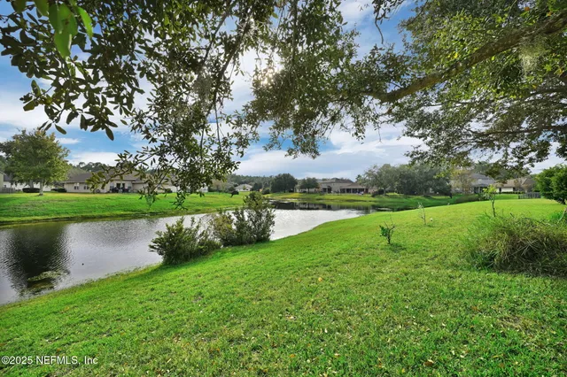 a view of a lake with a park