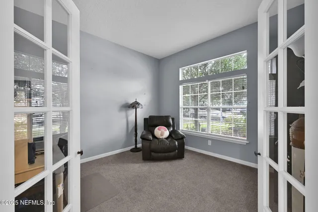 a room with furniture and a window