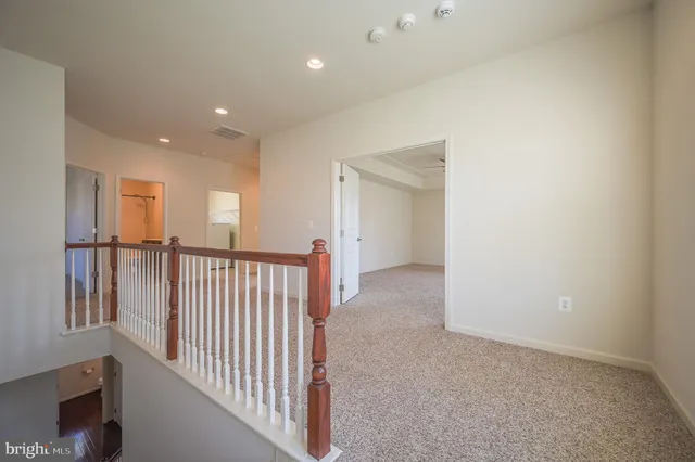 a view of a hallway with closet area