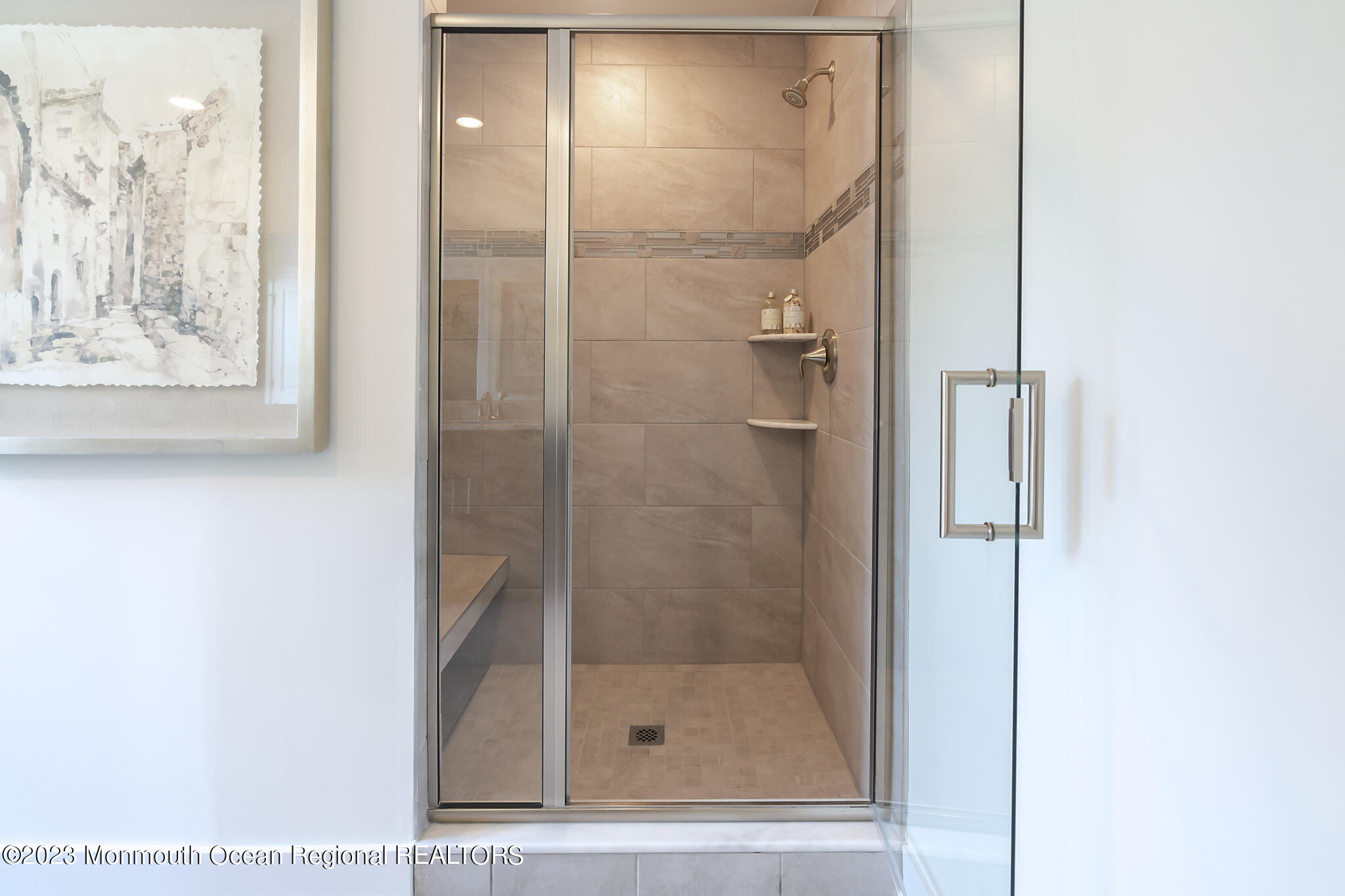 153 Woolley Court Asbury Park, NJ 07712 - Photo 16 of 23 a bathroom with a glass shower door