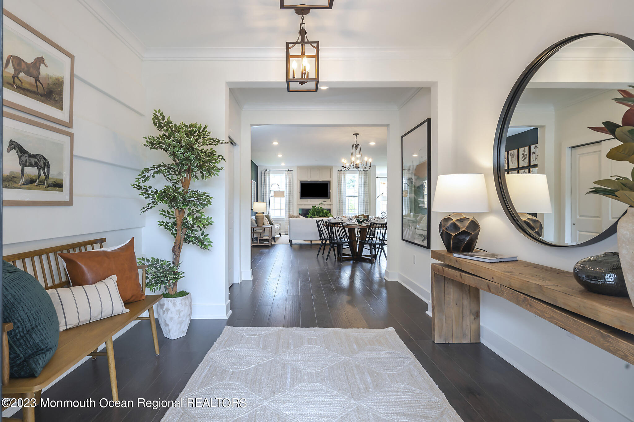 153 Woolley Court Asbury Park, NJ 07712 - Photo 2 of 23 a living room with furniture and a mirror
