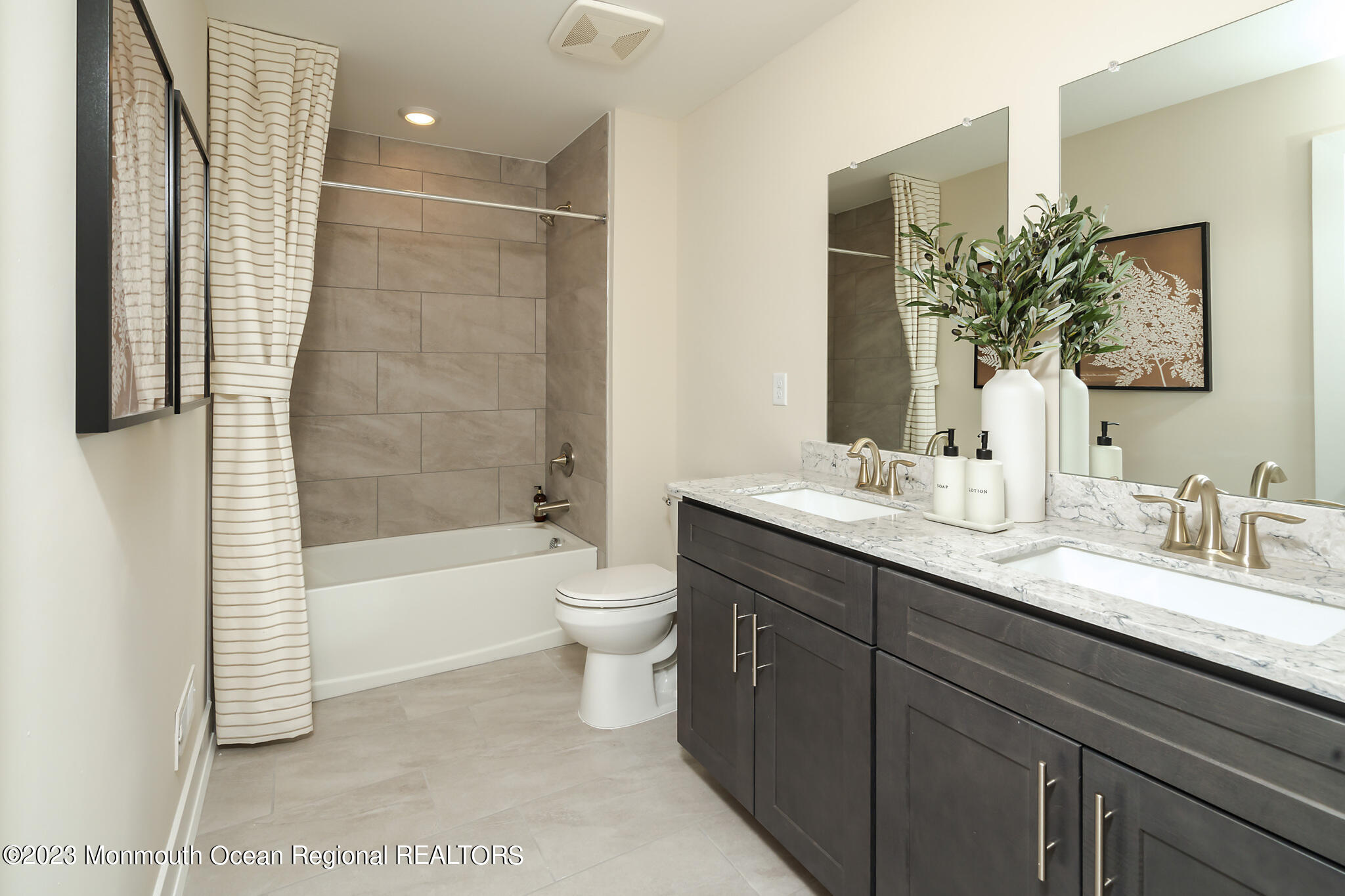 153 Woolley Court Asbury Park, NJ 07712 - Photo 22 of 23 a bathroom with a granite countertop sink and a mirror