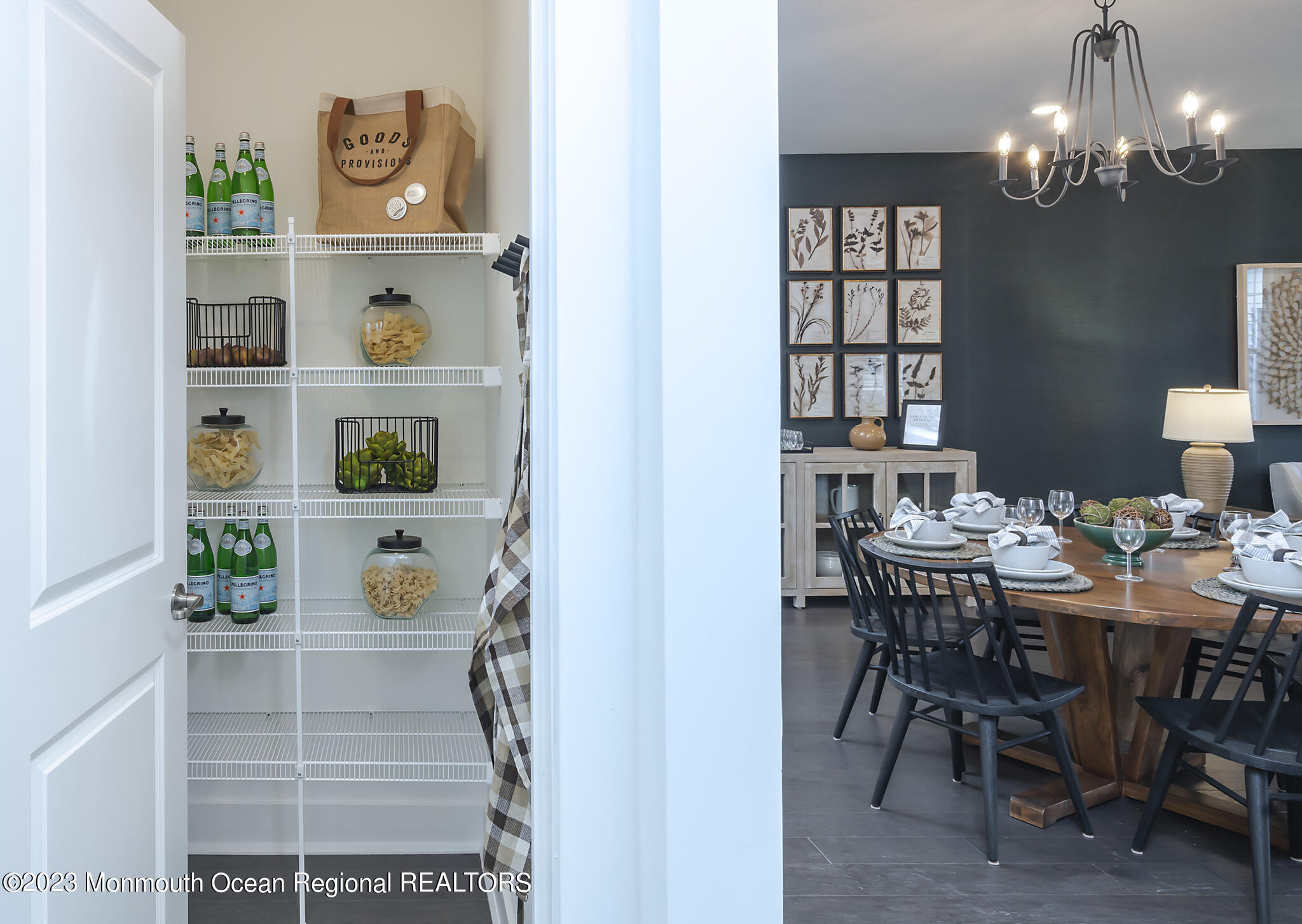 153 Woolley Court Asbury Park, NJ 07712 - Photo 6 of 23 a view of a dining room with furniture and chandelier