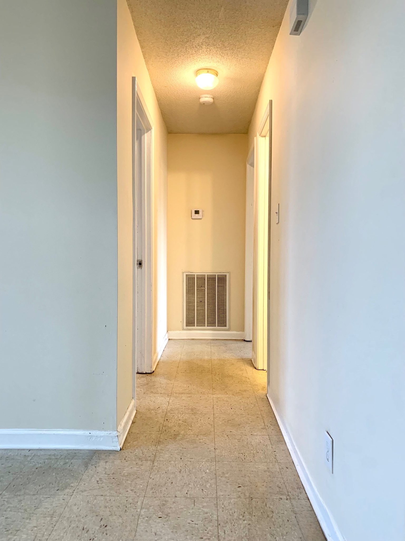 1113 Keith Avenue Oak Grove, KY 42262 - Photo 7 of 19 a view of a hallway with wooden floor and a bathroom