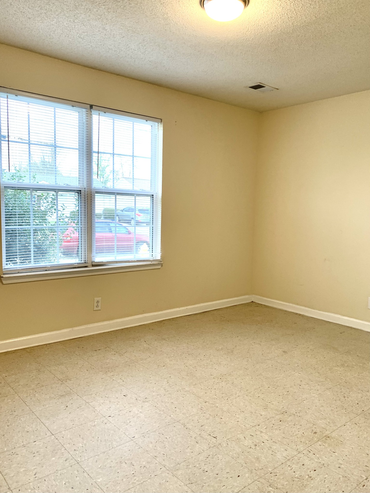 1113 Keith Avenue Oak Grove, KY 42262 - Photo 8 of 19 an empty room with a window