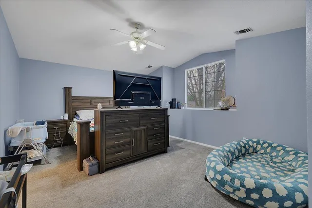 a room with furniture and chandelier