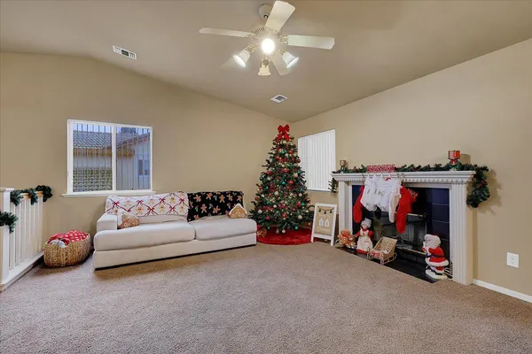 a bedroom with furniture and a chandelier