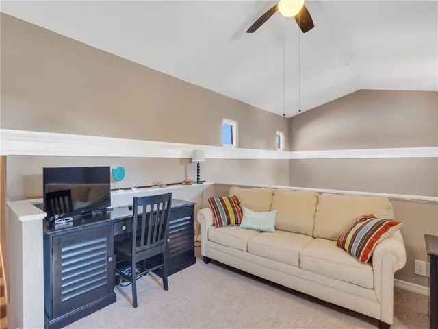 a living room with a couch and a flat screen tv