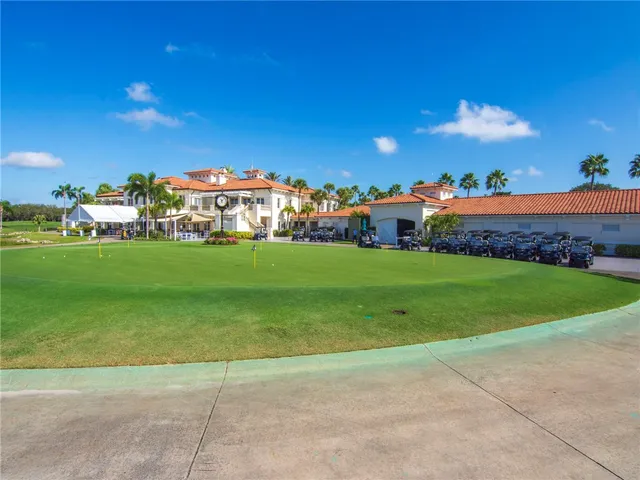 a view of a playground with a yard