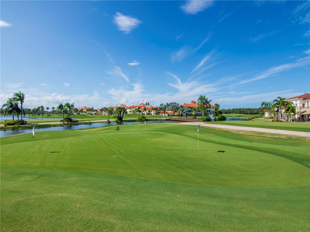 1370 St Davids Lane Vero Beach, FL 32967 - Photo 29 of 36 a view of a golf course with a lake