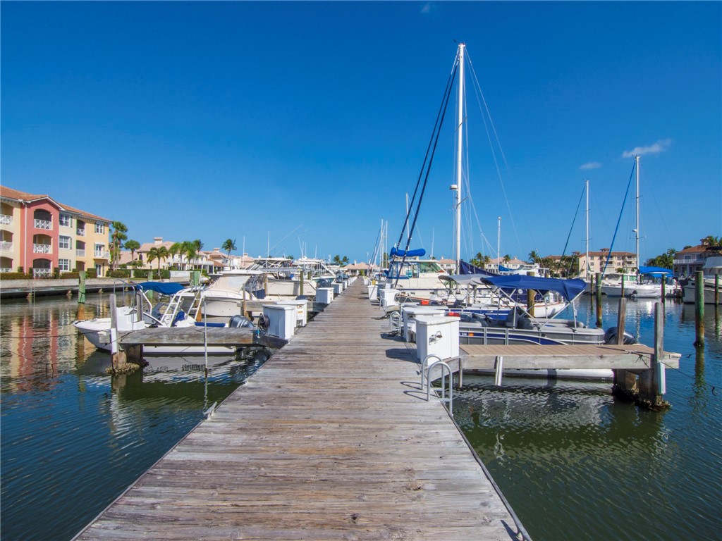 1370 St Davids Lane Vero Beach, FL 32967 - Photo 33 of 36 a view of a lake with boats and trees in the background