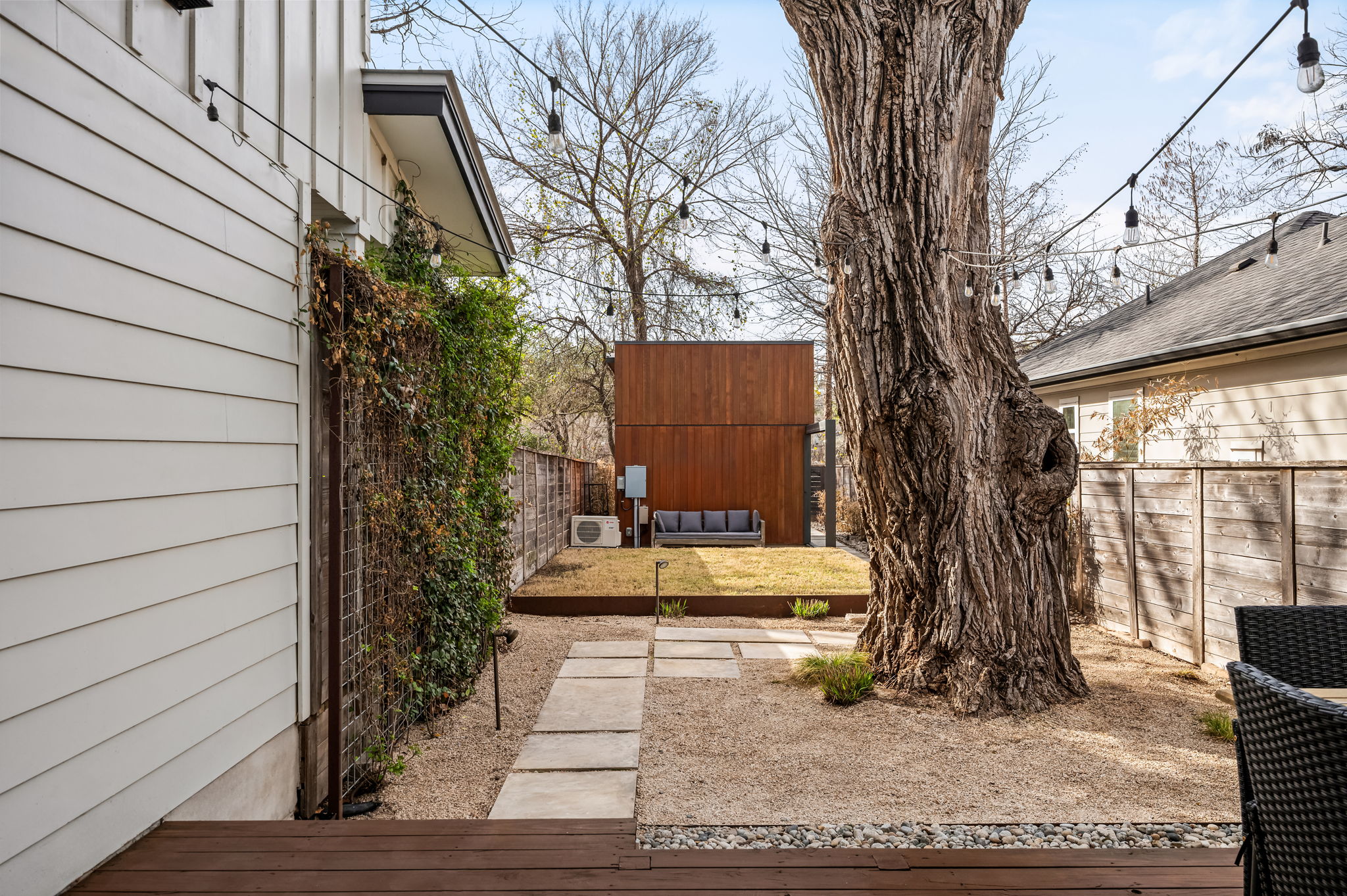 1124 Linden Street, Unit B Austin, TX 78702 - Photo 18 of 26 Fenced backyard featuring a wooden deck