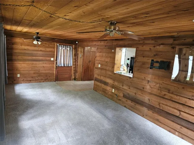 a view of a hallway with stairs