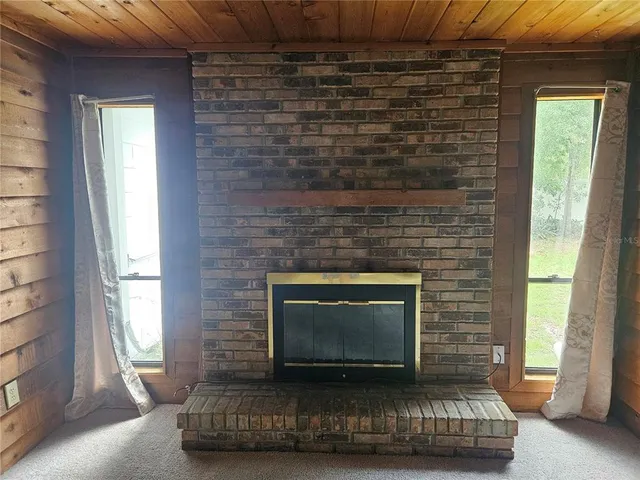 a living room with a fireplace in it