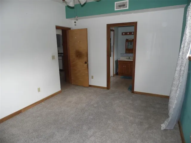 an empty room with closet