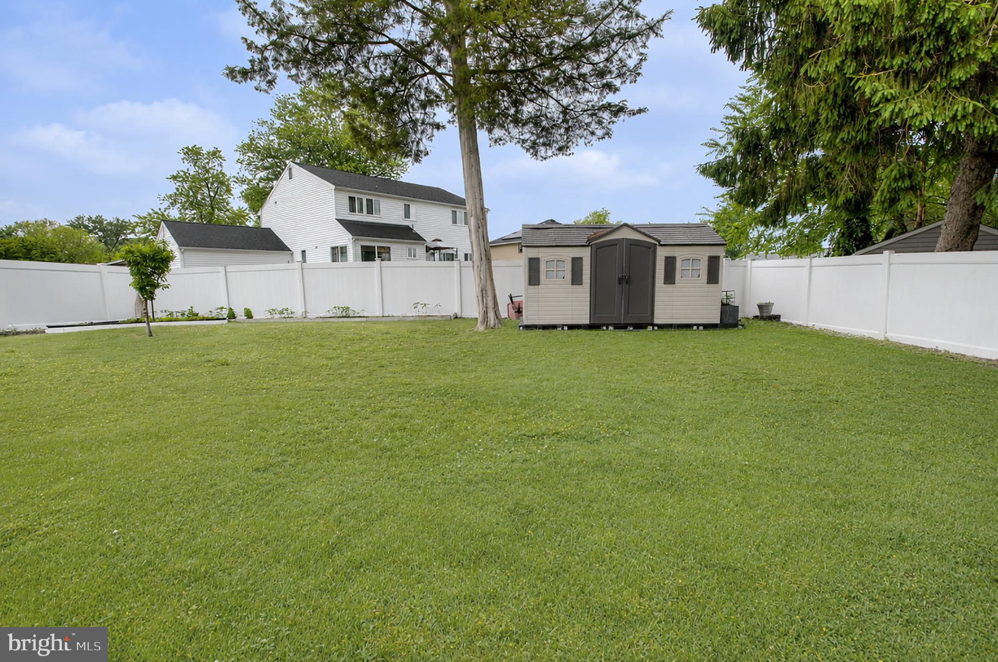 32 Bryant Road Turnersville, NJ 08012 - Photo 33 of 33 a front view of a house with a garden and yard