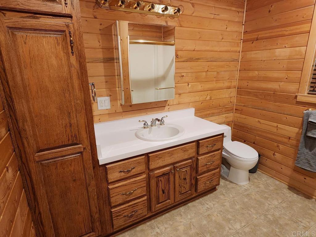 34675 Yuma Road Julian, CA 92036 - Photo 14 of 28 a bathroom with a sink a toilet and shower