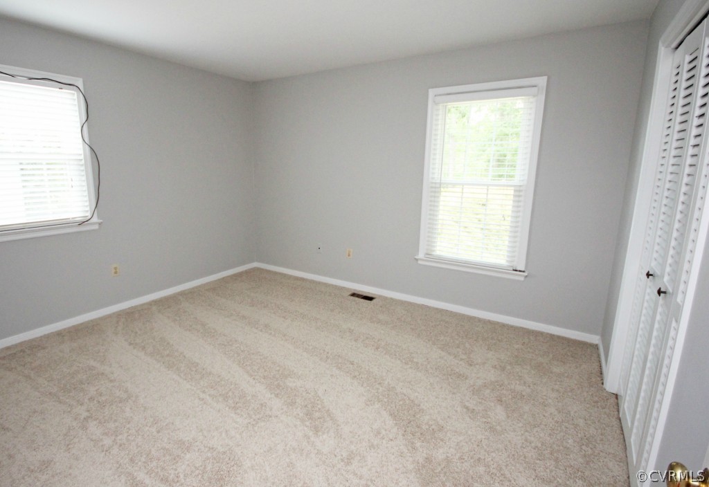 15321 Beach Road Chesterfield, VA 23838 - Photo 9 of 23 an empty room with a window