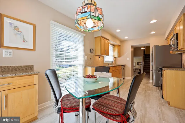 a workspace with furniture and a window