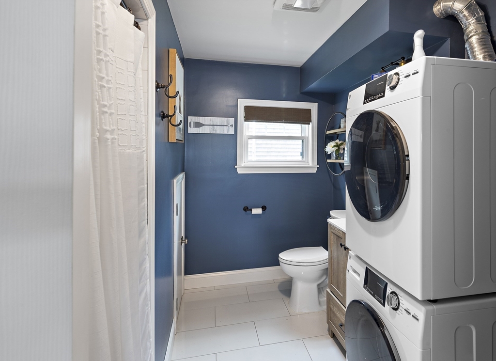 3 Clinton Road Revere, MA 02151 - Photo 13 of 19 a bathroom with a toilet and a sink