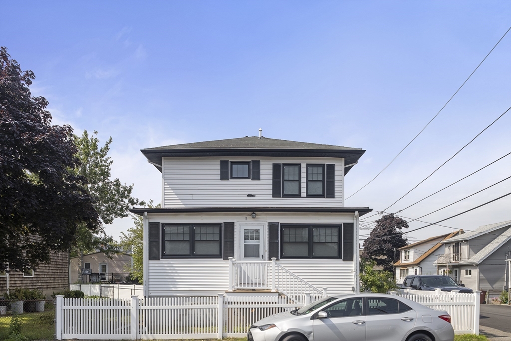 3 Clinton Road Revere, MA 02151 - Photo 17 of 19 a front view of a house with a yard garage and outdoor seating