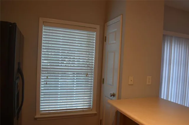 a view of a room that has a window in it