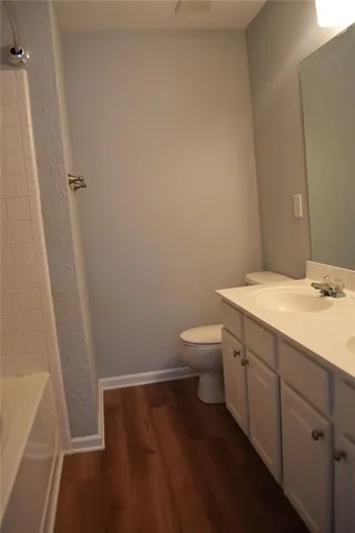 a bathroom with a sink and a toilet
